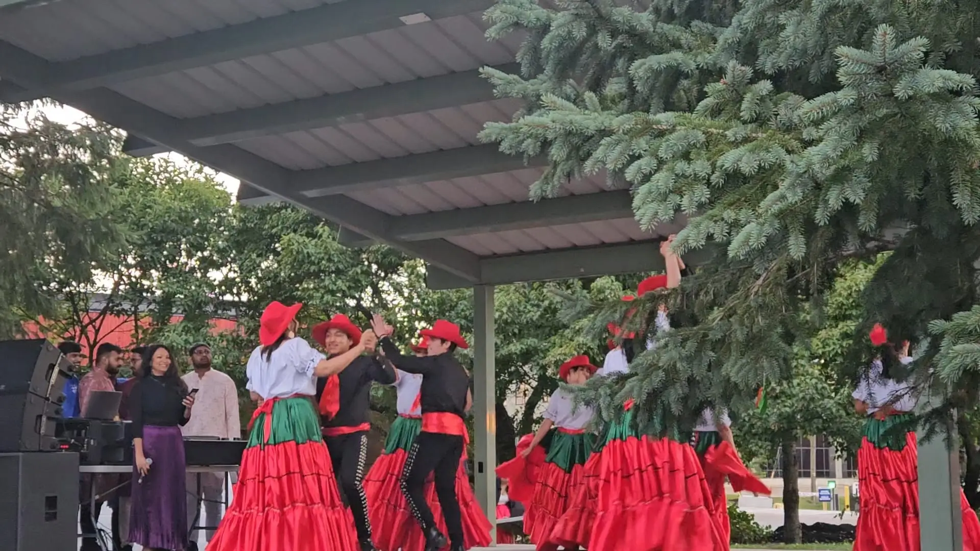 Performers at Moncton Multicultural Dance Festival 2024 dancing at Riverfront Park