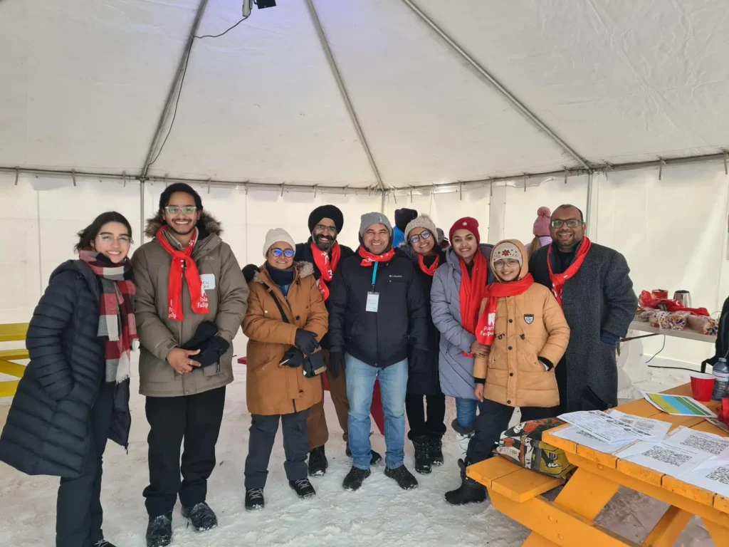 Moncton Cares volunteers at PolarFest 2025 engaging with the community