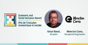 Ketan Raval accepting the Economic and Social Inclusion Award for Moncton Cares